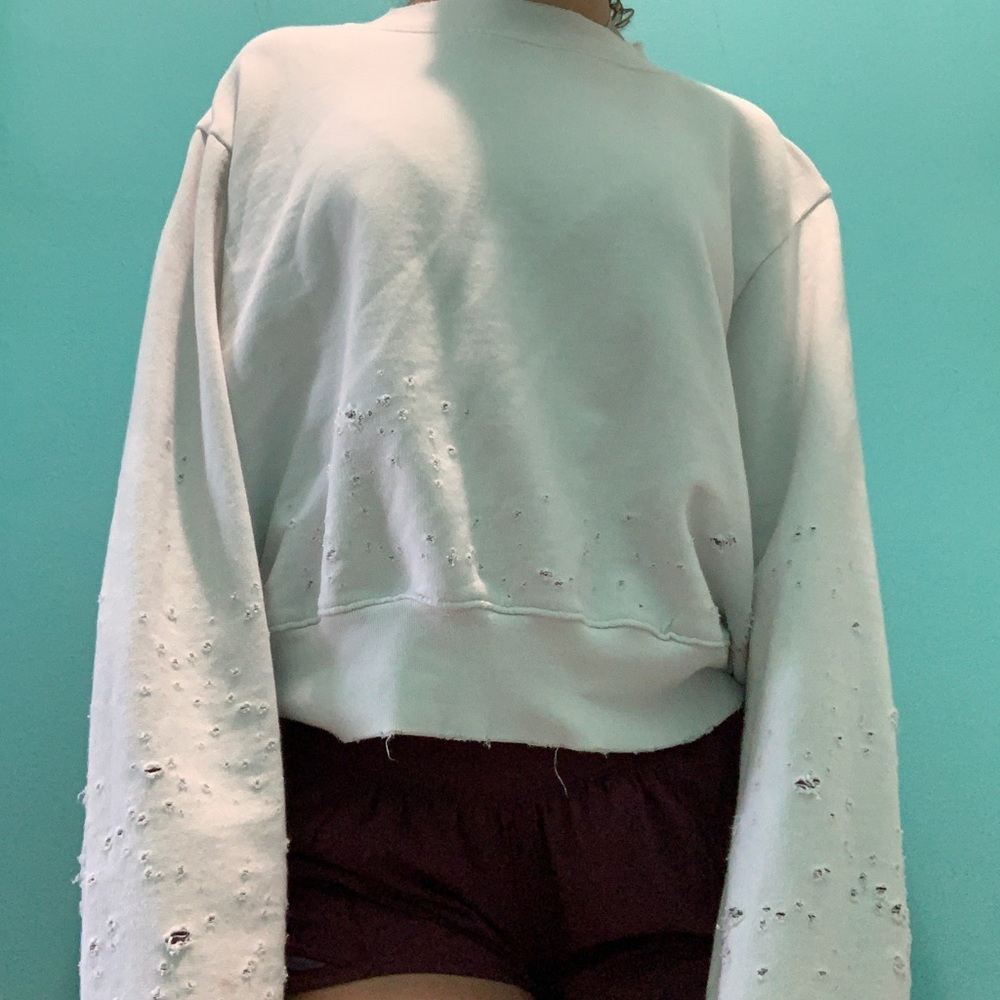 Cute distressed cropped sweater
